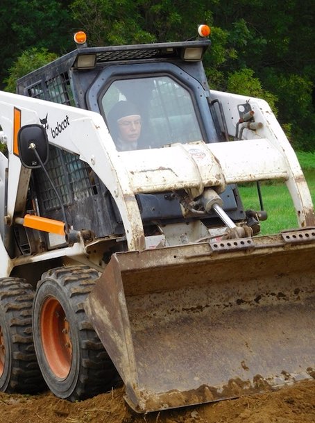 Nuns Learn to Operate Bobcat Loader to Restore New Home